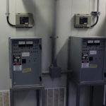 2 Eagle Eye Power Solutions BDS-Pro battery monitors mounted on wall in battery room