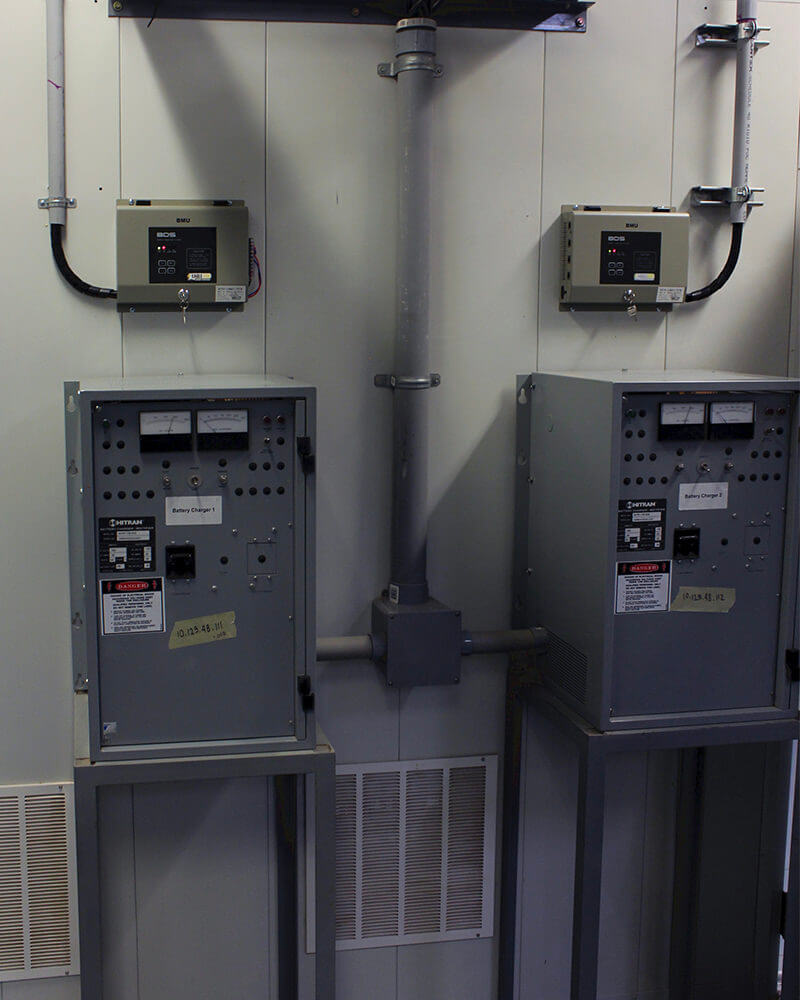 2 Eagle Eye Power Solutions BDS-Pro battery monitors mounted on wall in battery room