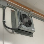Inside view of an Eagle Eye Power Solutions gas and ventilation system mounted on a wall