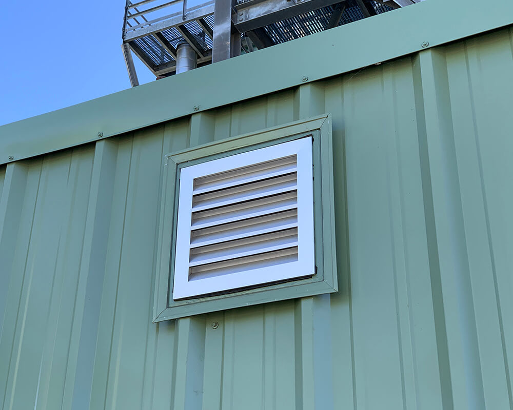 Outside view of an Eagle Eye Power Solutions gas and ventilation system on a building