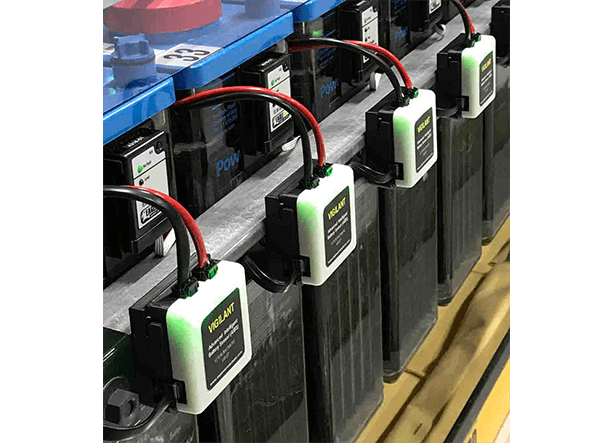 Close-up of Eagle Eye Power Solutions Vigilant sensors mounted on a row of batteries
