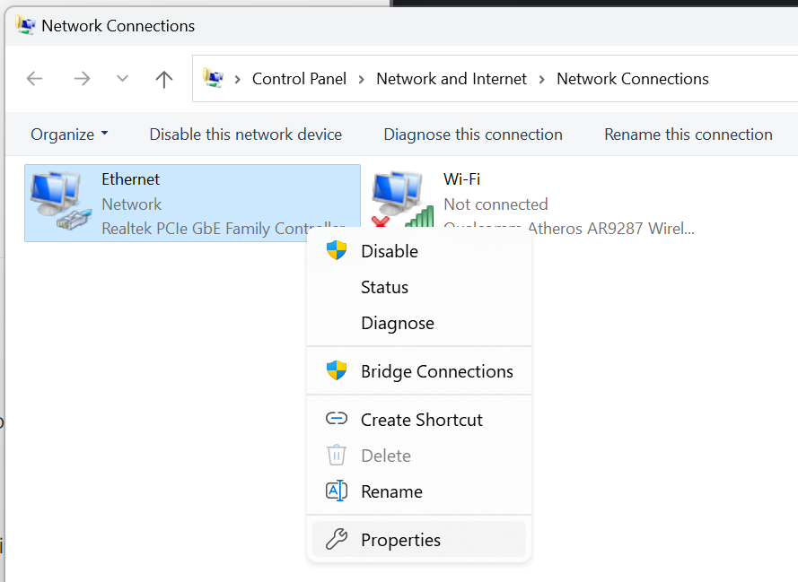 The Network Connections window in Windows with the Ethernet adapter selected. A right-click menu is open showing options such as Disable, Status, Diagnose, Bridge Connections, and Properties. The Ethernet connection uses a Realtek PCIe GbE Family Controller.