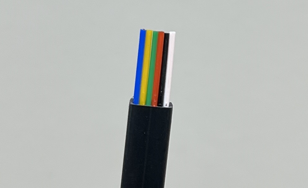 Close-up image of a stripped RJ12 cable with a black outer jacket, revealing six color-coded internal wires—blue, yellow, green, red, black, and white—neatly arranged and exposed for identification or termination.