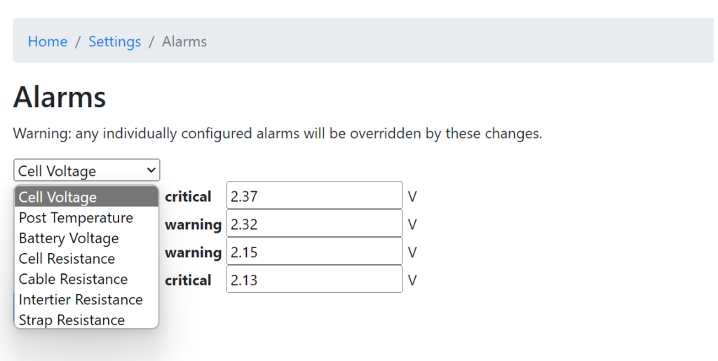 A screenshot of the "Alarms" settings page from the Eagle Eye Vigilant® Installer interface. A dropdown menu is open, showing different alarm types: Cell Voltage, Post Temperature, Battery Voltage, Cell Resistance, Cable Resistance, Intertier Resistance, and Strap Resistance. Current alarm thresholds for Cell Voltage are displayed: critical at 2.37V, warning at 2.32V, warning at 2.15V, and critical at 2.13V. A warning at the top states that any individually configured alarms will be overridden by these changes.