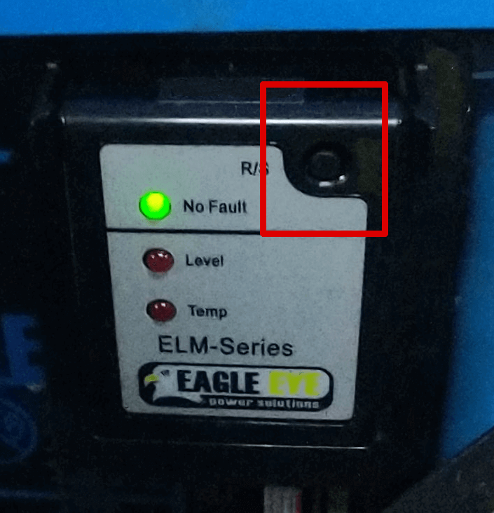 Close-up of the VIGILANT® ELM monitoring sensor with the reset button highlighted.