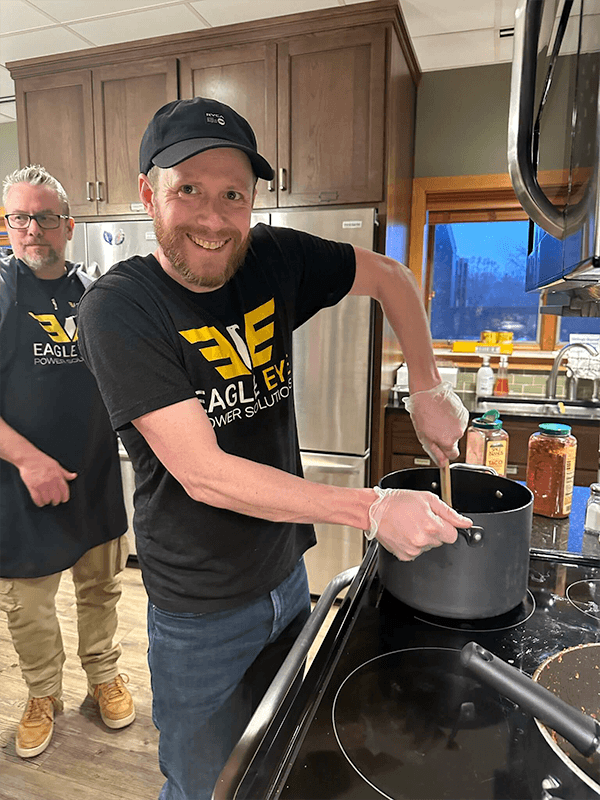 Kory Hooper and Toby Bywater prepping food for the Ronald McDonald House Charities during the Holidays, 2024.
